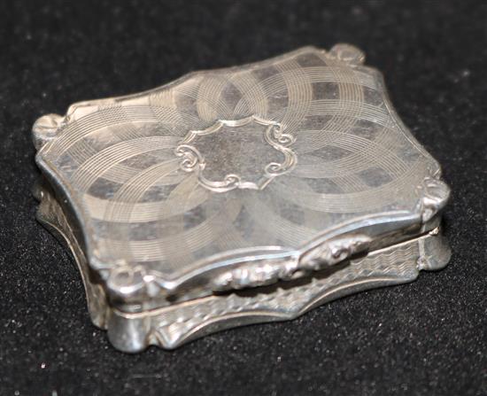 An early Victorian silver vinaigrette by Nathaniel Mills, 1.5in.